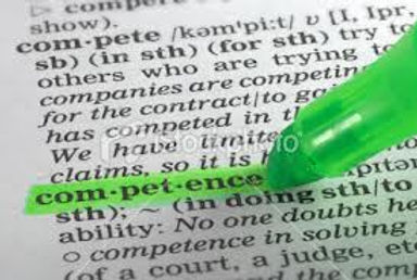 Green pen highlighting the word competence
