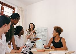 Five people collaborating and sharing ideas